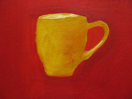 yellow cup on red